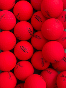 15 pelotas de golf Titleist rojas